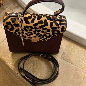 Excellent Condition: barely carried